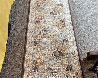 ITEM 32: Runner - earth tones, machine made. 8’ x 2’ $95