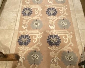 ITEM 38: Wool rug, pink with shades of blue flowers 6' X 3’ $165