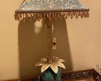 ITEM 40: Table lamp, green ceramic base with gold laurel leaves. 23” x 10.75” $48