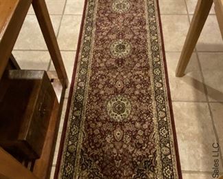 ITEM 39: Wool rug, deep reds, medallions. 10'2" X2'8" $185