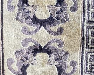 ITEM 45: Indigo blue/purple wool rug with bats, wool, hand-knotted. 7’ x 11’ $1,200