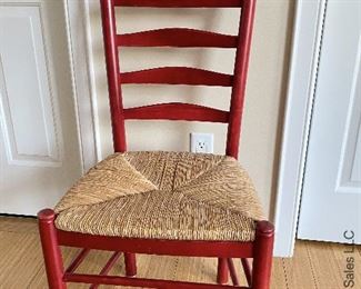 ITEM 57: Red Ladder Back Rush seat chair (slight wear), Woven American Flag Throw 70"X 49”, Wood Curl Patriotic Wreath $65