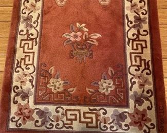 ITEM 73: Wool rug, rose and beige. 120” x 30” $495