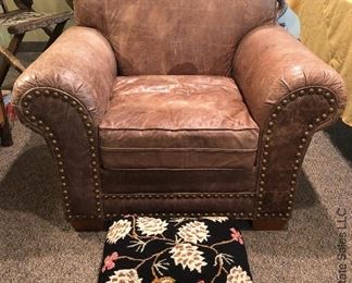 ITEM 96: Brown distressed leather chair 44"(W)X 3'3" (H) X 3' 1" (D) X 19" seat Height $385
