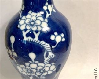 ITEM 101: 20th century small blue and white vase with flared top $28