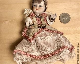 ITEM 106: two small porcelain dolls $20