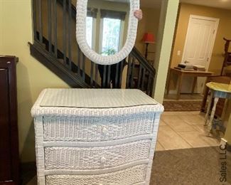 ITEM 135: Wicker dresser with custom cut glass top, and matching wicker rimmed mirror $135