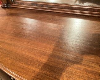 ITEM 137: Carved sideboard with removable mirror back, 5' (L} X 2' (D) X. 3'2" (H), with mirror 4' 6 1/2" (H) $325