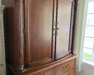 Solid wood armoire purchased from Wheelers furniture in Springfield. Holds up to a 42 inch flatscreen TV. In excellent condition!