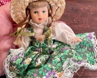 Item 46:  Porcelain Doll with Fabric Body and Straw Hat:  $8