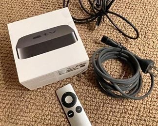 Item 126:  Apple TV with Silver Remote & Two Cords:  $48
