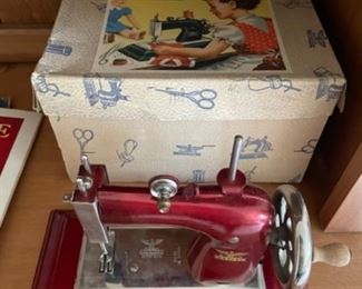 Antique children's sewing machine with original box (Casige, German)