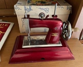 Antique children's sewing machine with original box (Casige, German)