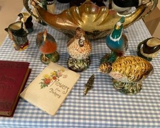 Ceramic birds, antique books 