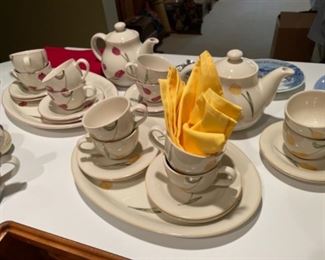 Two complete sets of modern floral tea service (red and yellow, 6 place settings each