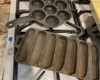 Vintage cast iron cornbread pan and Danish  Aebleskiver pan