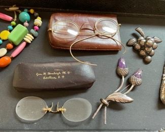 Antique glasses, sterling brooches 