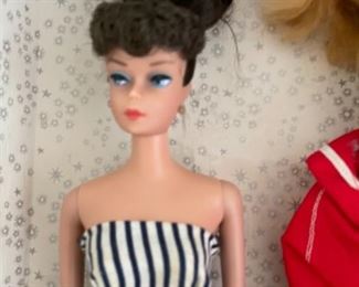 Vintage 1950s Barbies with case, dress, sweater, robe and scrabble board (sold as lot)