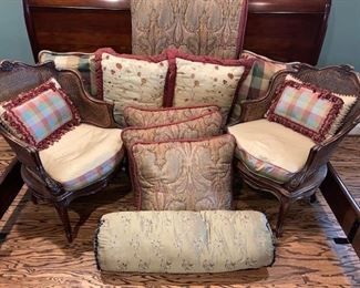 pair of wood and cane armchairs
