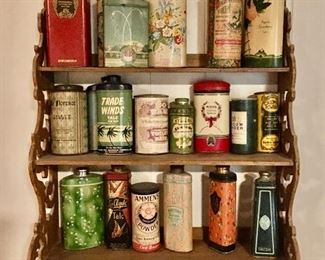 Vintage collection of talc powder tins