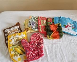 Assorted potholders and oven mitts