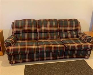 Plaid sofa 82 x 36 x 42 some damage to the cushions