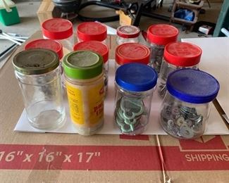 Containers of screws and other garage items