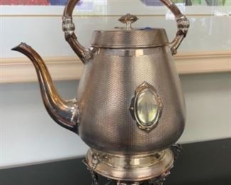 Antique Elkington “Engine Turned” kettle on stand.               $350