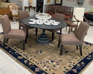 Custom Made “Memphis Style” dining table w/cast iron base.                                                            $750.                                                                          Set of 4 Stuart Furniture Designs “Ashley” dining chairs w/Pollock BeBop fabric.                        $1,600