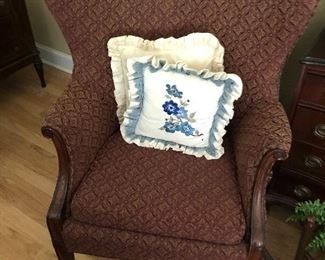One of many wing back chairs with ottoman. Different colors and patterns 