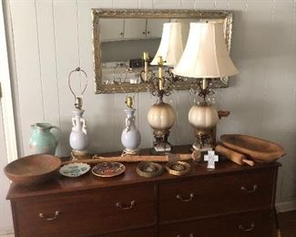 vintage lamps, sideboard table, wooden bowls, pitchers and collectible plates
