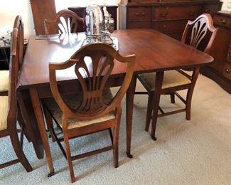 Drop leaf dining room table and 8 chairs!