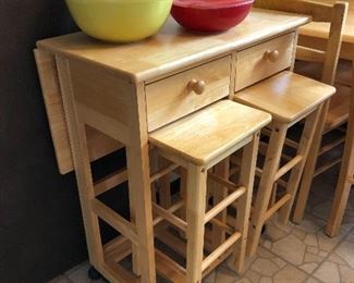 Adorable kitchen island with 2 stools!