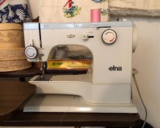 Vintage Elna Sewing Machine with accessories. In excellent condition. 