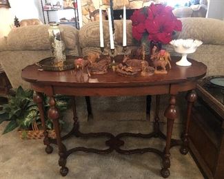 Antique Oval sofa table, 6 legs with ornate stretchers. Hidden front drawer 