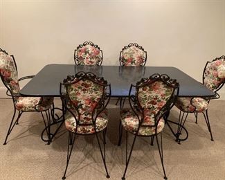 Woodard late 1950's wrought iron dining set with faux marble top and 6 chairs:  Table: 29hx 71x 41.5 Chairs: 40hx 17x 15 