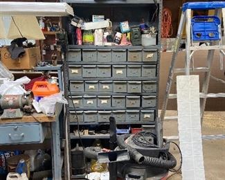 Metal cabinet with bins