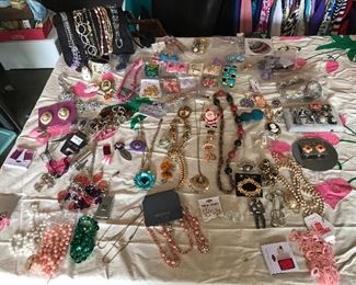 There are two six ft tables full of costume jewelry. Much of it new in the package. 