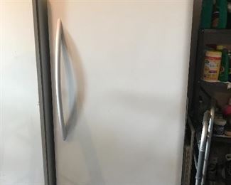 Upright freezer with door