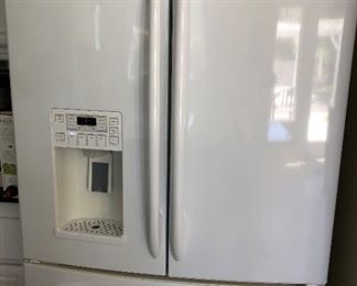 #65. $600.00. GE Profile Refrigerator.   Purchased new in 2012