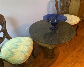Two side chairs and round side table