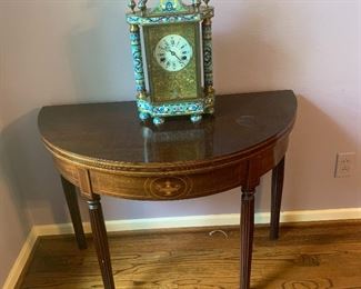 Half-moon table and cloisonne clock
