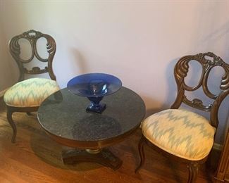 Matching side chairs and granite top round side table