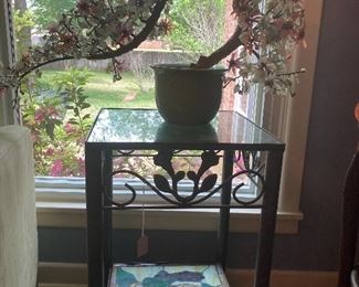 Jade cherry blossom sculpture and colored glass and iron side table.