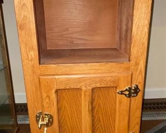 Oak ice box-style cabinet.