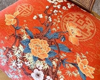 Close up of the upholstered seat of the dining chair.