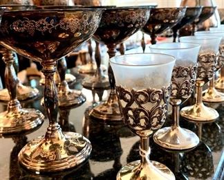 Several sets of vintage silver wine/cordial goblets.