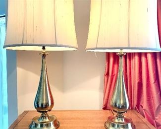 $200 Pair of Mid Century Modern Tear Drop Style Brass Lamps. We love the elegant style these lamps bring to the table!