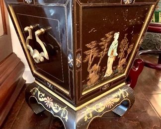 Handcrafted planter with enamel detail and galvenized liner. 