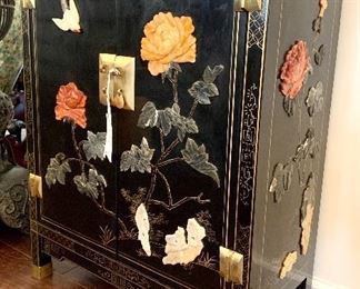 $350. Chinioserie two door cabinet with natural stone, jade glass details. 